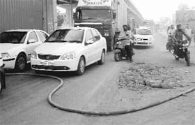 Traffic jam was caused after a high voltage wire fell on the Zirakpur-Chandigarh road on Wednesday