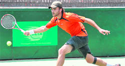 Marc Fornell of Spain attempts a return during the Union Bank ITF Men's Futures Tennis Tournament at the CLTA in Sector 10, Chandigarh, on Thursday. 