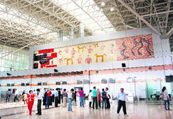 Passengers coming out from the newly built up terminal at the Chandigarh Airport on Thursday.