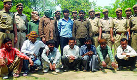The robbers in police custody in New Delhi on Thursday. 