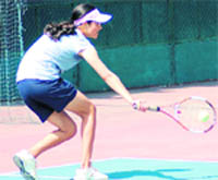 A player in action in the All-India Tennis Talent Series Tournament in Dehradun 