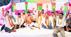 BJP workers protest against party MLAs for cross-voting in the Legislative Council elections, outside the party headquarters in Jammu on Thursday