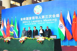 BRICS leaders, Indian Prime Minister Manmohan Singh, Russian President Dmitry Medvedev, Chinese President Hu Jintao, Brazilian President Dilma Rousseff and South African President Jacob Zuma (From left to right) during a joint declaration at the one-day summit in Sanya, China, on Thursday