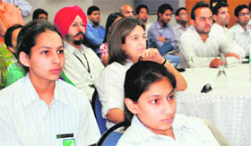 Students listen to experts during the conference.