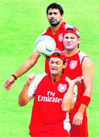 Kings XI Punjabs Adam Gilchrist heads a football during a training session in Hyderabad on Friday. 
