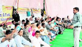 Unemployed teachers holding the BEd and BPEd degrees stage a dharna in support of their demands at Gandhi Park in Dehradun on Saturday