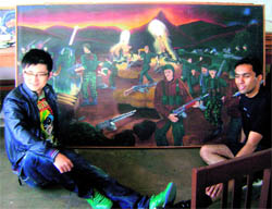 Meiyang Chang in front of a painting made by him during his school days at Wynberg Allen School at Mussoorie