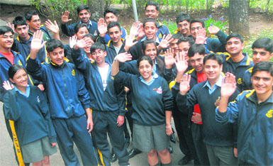 Students from Lawrence College, Pakistan (in blue track suits) with students of Lawrence School, Sanawar, Himachal Pradesh, during their visit to the school.