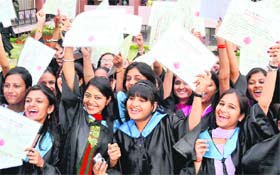 Girls in a jubilant mood after receiving degrees at the annual convocation of the Dev Samaj College of Women in Chandigarh on Sunday