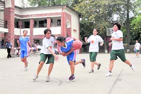 A match in the District Junior (Under 18 years) Basketball Championship for Boys and Girls, being played in Dehradun on Sunday