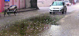 The Railway road dotted with hail in Sonepat on Sunday.