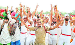 Jawans celebrate after the passing-out parade in Jalandhar.