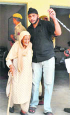 Sadhro Kour returns disappointed from a polling station at Sai Kalan Moila, in RS pura on Sunday. 