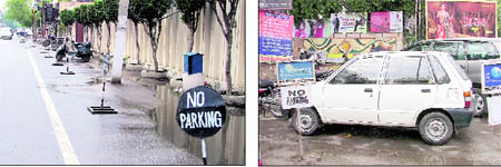 No-parking boards put outside a house on college road and a mall (right) in Ludhiana