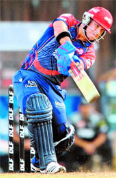 Delhi Daredevils David Warner plays a shot during their match against Pune Warriors India at the D.Y. Patil stadium in the outskirts of Mumbai on Sunday. Dardevils won by three wickets
