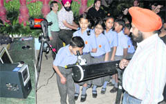 Students of Dikshant International School watch star-studded sky with a high-powered telescope at Zirakpur 
