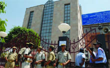 PAC security guards (above) and general public (right) outside the Centre for Development of Advanced Computing (CDAC) during the draw of lots for the DDA Housing Sechme-2010 at Sector 62 in Noida, UP, on Monday.