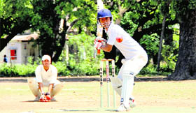 A batsman in action in the Beehive Cricket Twenty-20 tournament played at the Matawala Bagh grounds in Dehradun on Monday.