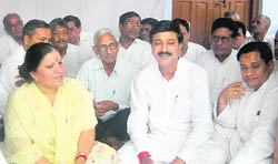Health Minister Rao Narender and Education Minister Geeta Bhukkal interact with mediapersons in Jhajjar