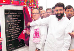 Finance Minister Capt Ajay Singh Yadav lays the foundation stone of Kribhco Container Depot in Rewari.