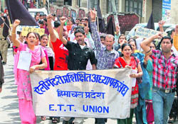ETT teachers protest against the state government at Dharamsala on Monday.