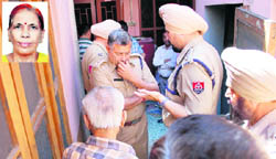 Dr S.K. Kalia, ADCP, and Balkar Singh, ACP, at the house where Lajwanti was found murdered in Jalandhar on Monday.
