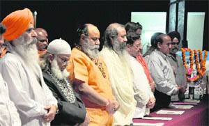 Priests and leaders of different parties pay tributes to people of Japan, who died in tsunami, at a function at the University of Jammu on Monday.