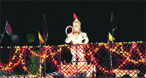 A night view of the statue of God Hanuman near Vijaypur city.