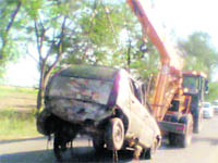 A vehicle recovered from the Bhakra canal being towed away at Fatehgarh Sahib on Tuesday.