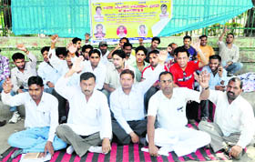 Members of the Chhatra Chetna Sangathan hold a dharna in support of their demands at Gandhi Park in Dehradun on Tuesday.