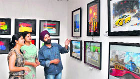 Artists Tajinder Ladi Singh and Hema Singh at the exhibition at the Virsa Vihar in Jalandhar.
