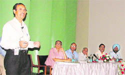 Dr Anil Kakkar, a speaker, discusses issues during the sedond day of the Insect Congress at PAU in Ludhiana on Tuesday. 