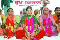  Kiranjit Kaur, Veerpal Kaur and Ranjit Kaur sitting on hunger strike in support of their kin