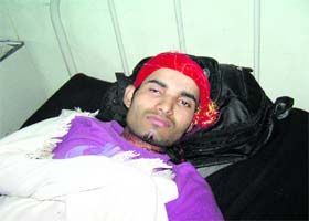Raj Kumar under treatment in Tanda Medical College, Kangra, on Wednesday