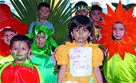 Tiny-tots of the Daddys Teddy, a playway school, during the Earth Day celebrations in Bathinda on Thursday.