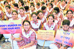 Students of a convent school in Gandhi Nagar participate in an awareness programme against female foeticide in Jammu on Thursday