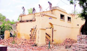 The historic Kotwali police station in Ludhiana being demolished by the civic body.