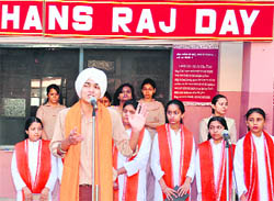 Students of DAV Public School offer prayer on the birth anniversary of Mahatma Hans Raj in Amritsar