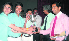 The Doon School team with the runners up trophy at the RIMC Challenge Quiz held in Dehradun on Friday.
