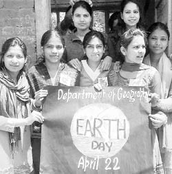 Students of the geography department celebrate World Earth Day at Himachal Pradesh University in Shimla on Friday.