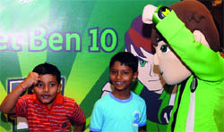 Children enjoy with Cartoon Network's superhero  Ben 10 during a promotional event in New Delhi on Saturday.