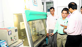 Director-General, Heath Services, Narveer Singh has a word with an official after inaugurating the laboratory in Karnal on Saturday.