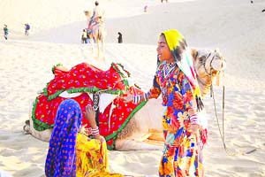 At Sam sand dunes, local artistes entertain visitors