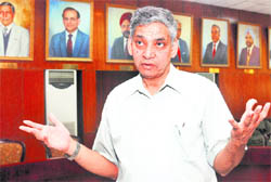 Prof KK Talwar, the outgoing Director of PGI, will demit office on April 30. Visible in the background are portraits of former directors