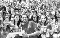 Students in a joyous mood after receiving their prizes during the annual function of SD College at Sector 32 in Chandigarh on Sunday
