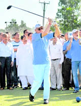 Union Minister Farooq Abdullah plays a shot during the inauguration of the Jammu-Tawi Golf Range in Jammu on Sunday.