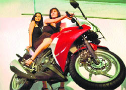 Models and visitors pose with their favourite bikes and cars during the three-day auto expo Auto Mall that concluded in Ludhiana on Sunday