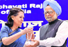 PM Manmohan Singh with AICC chief Sonia Gandhi at a function in New Delhi. 