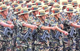 Nepalese soldiers participate in a parade marking Republic Day in Kathmandu on Sunday