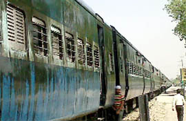 The Jammu-Bathinda Express drenched in diesel stands at Romana Albela Singh station near Kotkapura on Monday.